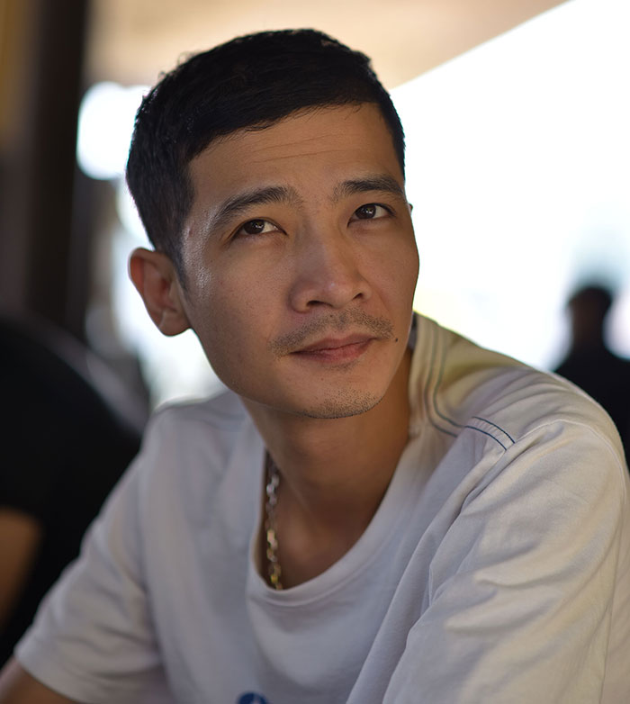 A thoughtful man contemplating culture shocks and intercultural relationships.