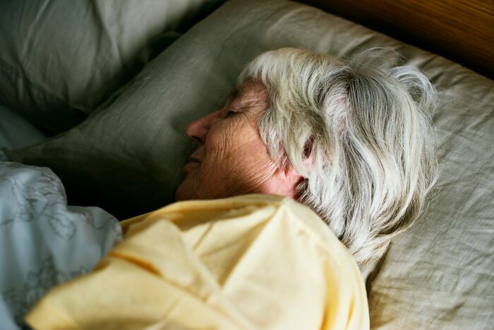An elderly woman sleeping peacefully, a stark contrast to disturbing facts that can change perceptions.