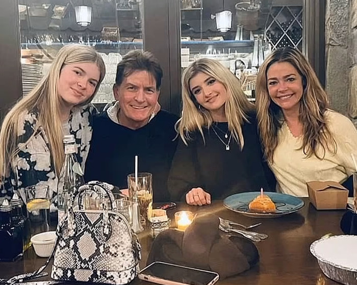 Charlie Sheen and Denise Richards with their daughters, Lola and Sami Sheen, a nepo baby, at a restaurant. Charlie Sheen and Denise Richards with their daughters, Lola and Sami Sheen, a nepo baby, at a restaurant.