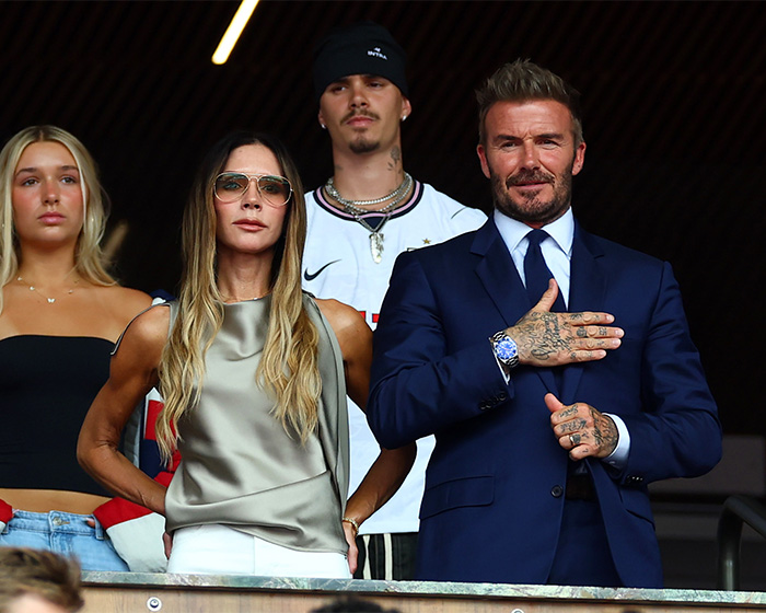 Victoria Beckham's behavior at World Cup match sparks mockery, as David Beckham stands beside her at the game.