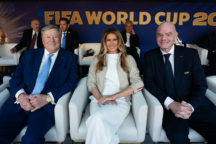 Melania Trump, her father, and Gianni Infantino at a FIFA event, fueling Donald Trump body double claims. Melania Trump, her father, and Gianni Infantino at a FIFA event, fueling Donald Trump body double claims.