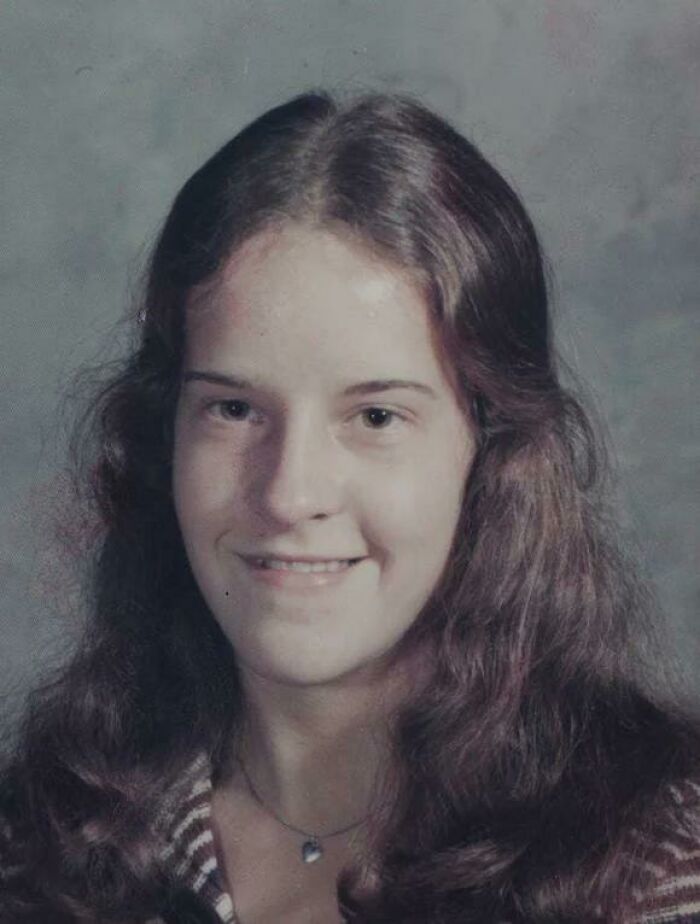 A young woman with long dark hair, a mystery case where people know who is to blame.