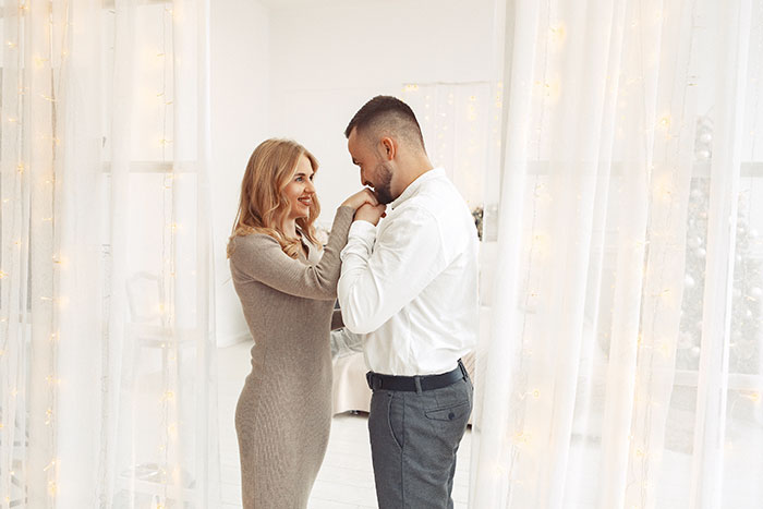 A happy couple at their childfree wedding, sparking a family feud with MIL. A happy couple at their childfree wedding, sparking a family feud with MIL.