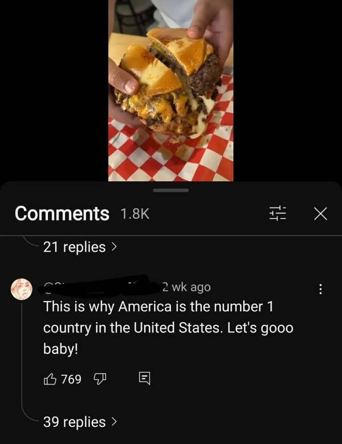 A screenshot of a comment below a burger video stating America is the number 1 country in the United States, proving American confusion.