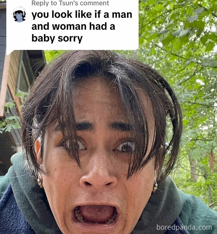 A person with dark hair and wide eyes, mouth open in surprise, reacting to a comment about weird memes.