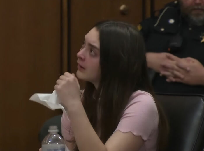 Mackenzie Shirilla, emotional, appears in court, holding a tissue during a legal setback, looking up with tears in her eyes. Mackenzie Shirilla, emotional, appears in court, holding a tissue during a legal setback, looking up with tears in her eyes.