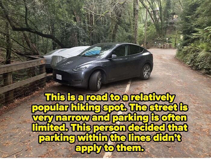 A car parked poorly on a narrow road leading to a hiking spot, showing main character parking.