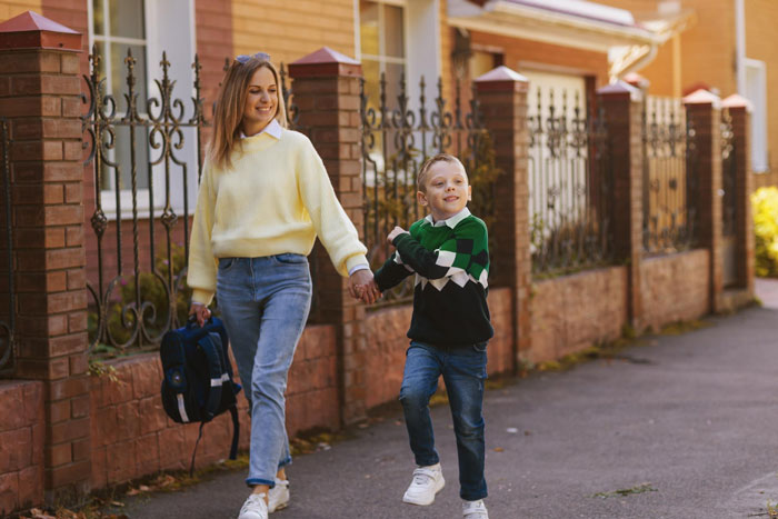 A mom and child walking to a community class, reflecting the Entitled Mom story where she treats it like free daycare. A mom and child walking to a community class, reflecting the Entitled Mom story where she treats it like free daycare.