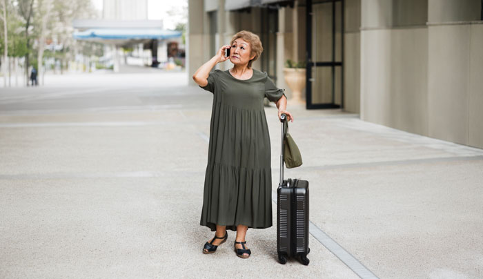 An older woman with a suitcase on the phone, an entitled mom tries to frame son. An older woman with a suitcase on the phone, an entitled mom tries to frame son.