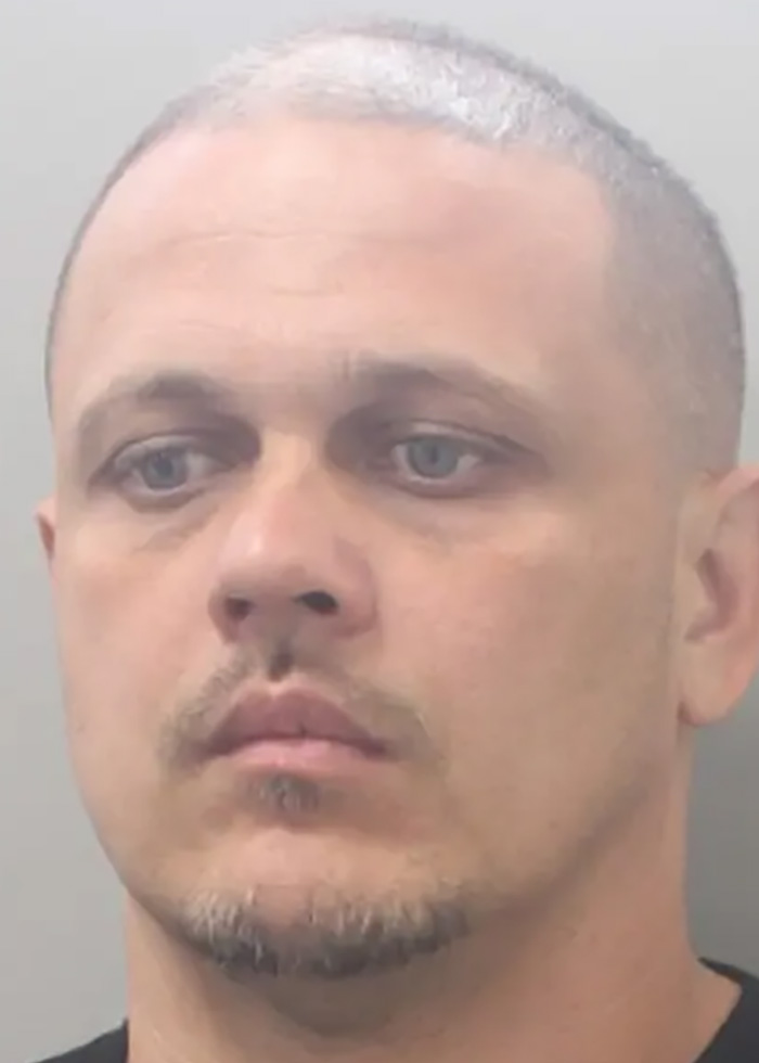 Mugshot of a man with short, light hair and a goatee, related to stupid arrests.