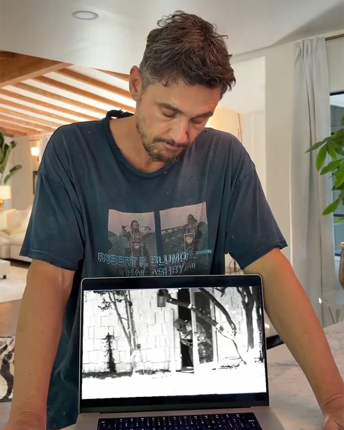 James Franco looking at a laptop showing a security camera's view of a supposed alien. James Franco looking at a laptop showing a security camera's view of a supposed alien.