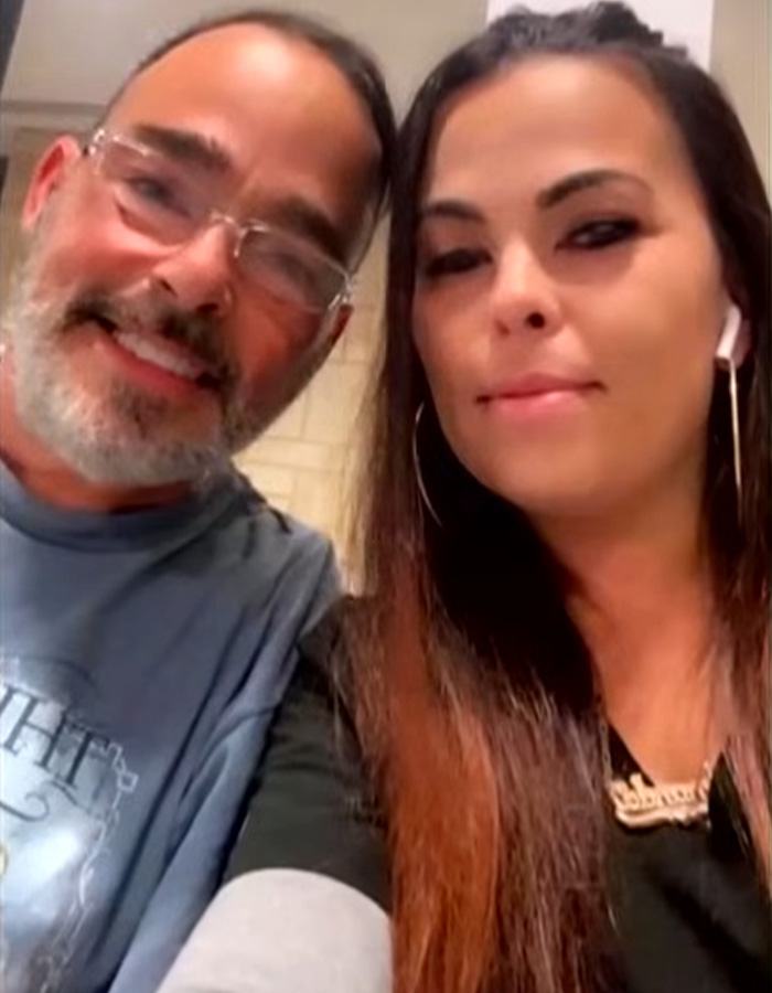 An Army veteran with a beard and glasses next to a woman, related to a Walmart parking lot dispute. An Army veteran with a beard and glasses next to a woman, related to a Walmart parking lot dispute.