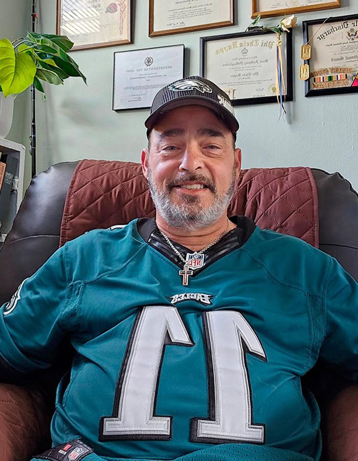 Army veteran in Eagles jersey, smiling, before the disturbing Walmart parking lot incident and horrific end. Army veteran in Eagles jersey, smiling, before the disturbing Walmart parking lot incident and horrific end.