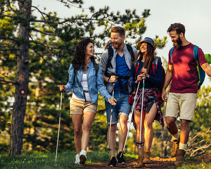 Four people hiking together, illustrating a contrast to a lonely man's plea. Four people hiking together, illustrating a contrast to a lonely man's plea.
