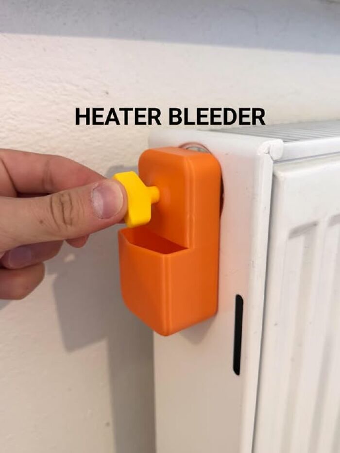 A 3D printer created heater bleeder tool being used, showing a practical and functional household item.