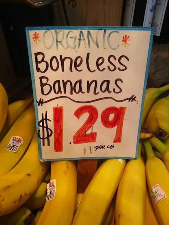 A hilariously failed sign advertises organic boneless bananas for $1.29 per lb.