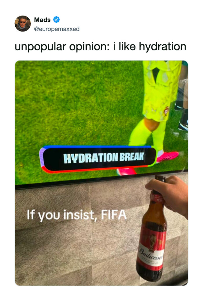 Funny World Cup tweet showing a hand holding a beer in front of a TV displaying a hydration break message.