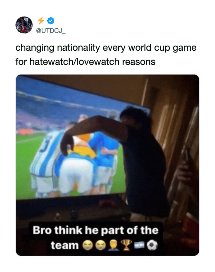 A man with his arm extended, seemingly hugging a TV showing a World Cup football match. Funny football fans World Cup tweets.