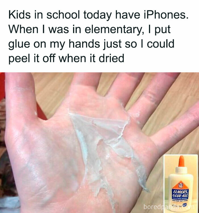 A hand peeling dried glue, a common Gen X memory, with a bottle of Elmers glue.