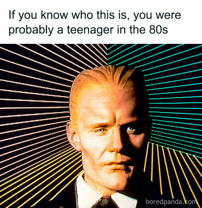 A close-up of Max Headroom, a digital character with a retro background, a Gen X meme that unlocks memories.