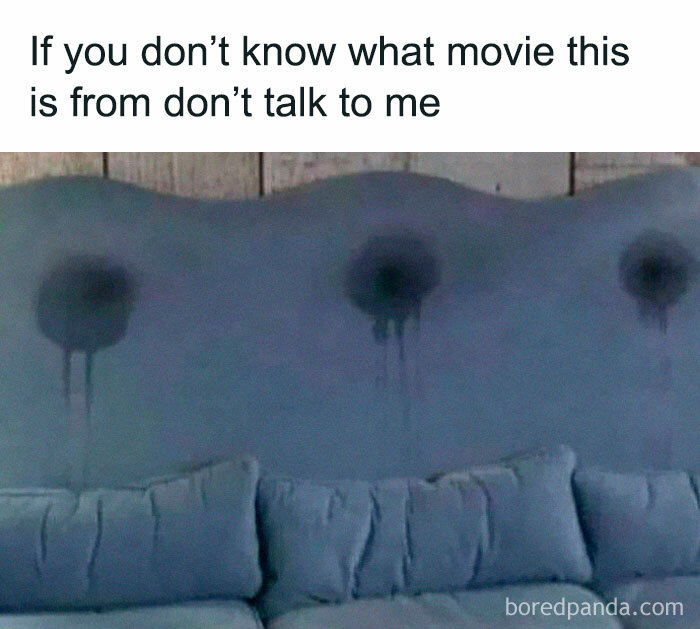 A blue couch with three dark, wet stains, a classic Gen X movie memory.