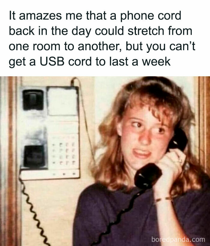 A Gen X woman talking on a corded wall phone, highlighting a memory of phone cords stretching from room to room.
