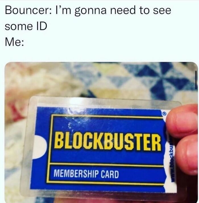 A hand holding up a Blockbuster membership card as ID, a classic Gen X meme.