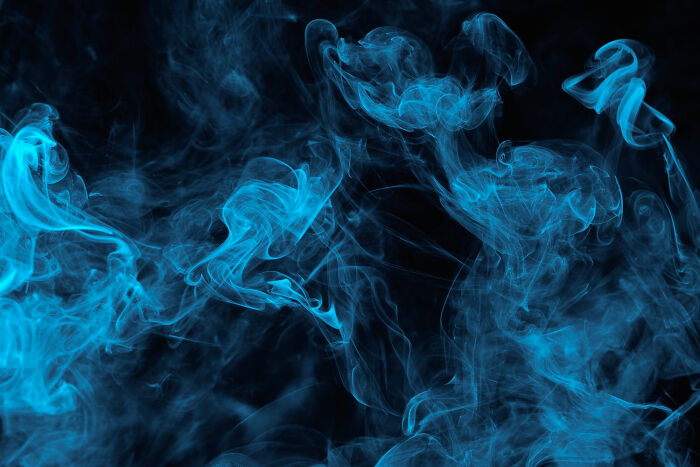 Blue smoke swirling against a dark background, illustrating common things that may be worse than we realize.
