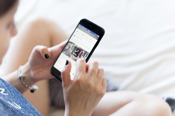 A person using a smartphone, symbolizing common things that are far worse than we realize from netizens.