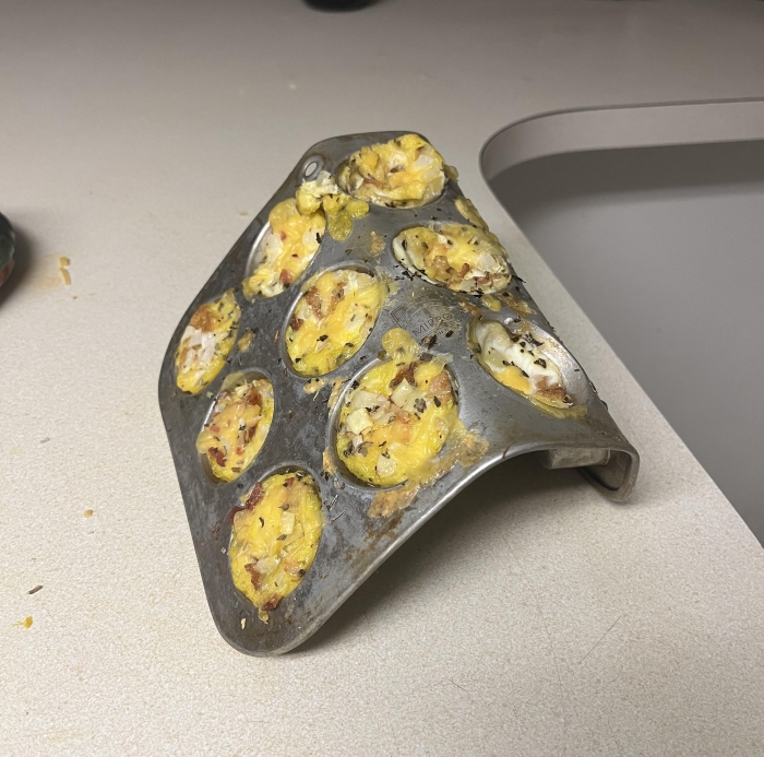 A true crime story waiting to happen: Muffin pan with remnants of egg bites.