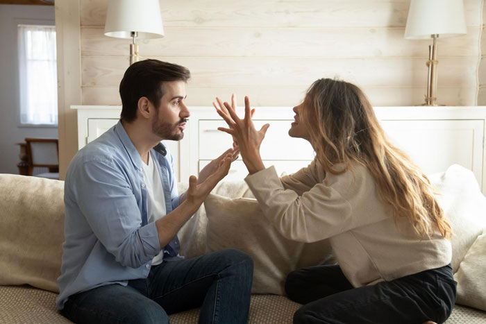 A couple arguing, showing the tension that could lead a groomsman to boycott his best friend's wedding. A couple arguing, showing the tension that could lead a groomsman to boycott his best friend's wedding.