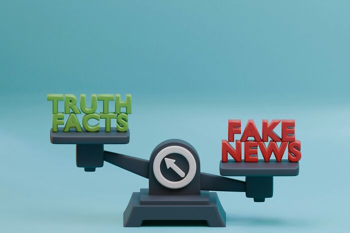 A scale balancing green Truth Facts against red Fake News, symbolizing the challenge of telling apart the real from the fake. A scale balancing green Truth Facts against red Fake News, symbolizing the challenge of telling apart the real from the fake.