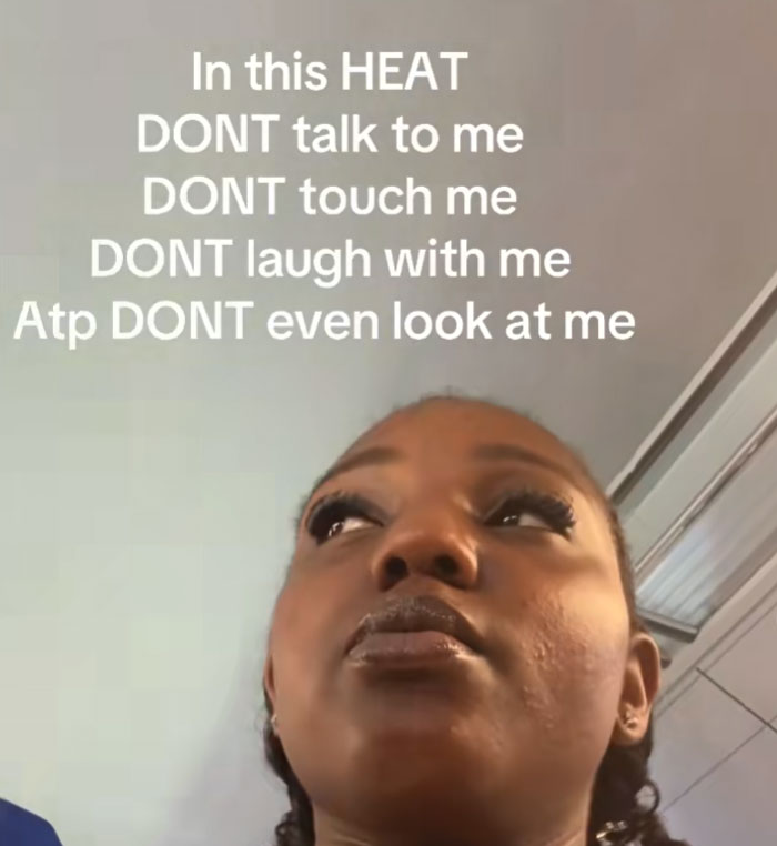 A woman looking annoyed with text listing things not to do in this heat. This is one of many funny memes about summer heat.