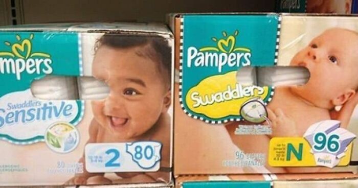A display of two Pampers Swaddlers boxes, where the packaging design makes it look like babies are eating tampons due to a designers failed job.