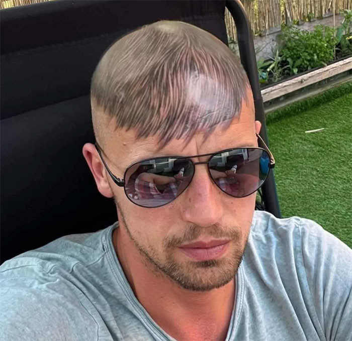 A man with a hair tattoo resembling a bad haircut, highlighting hilariously bad hair mistakes.
