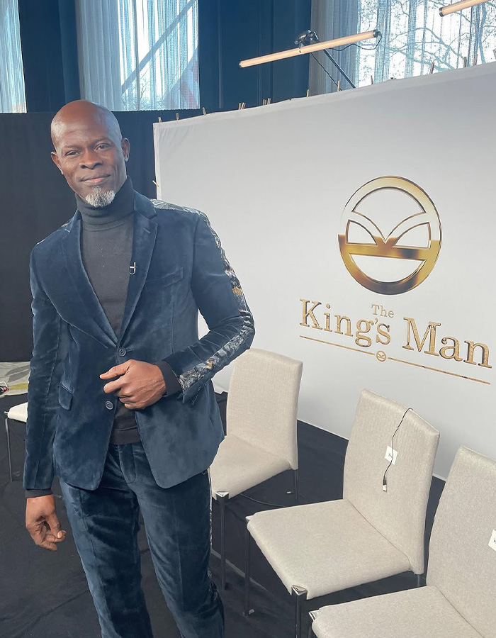 Hollywood Star Djimon Hounsou at The King's Man event amidst custody battle and income discussions.