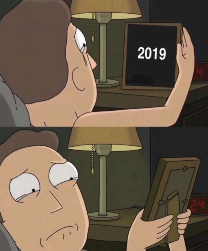 A crying cartoon character holding a framed image with 2019 on it, a relatable meme from No Context Humans.