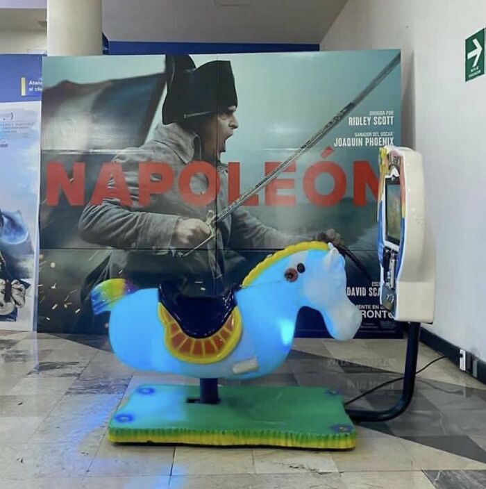 A glowing blue coin-operated horse ride in front of a Napoleon movie poster, featured in entertaining memes.