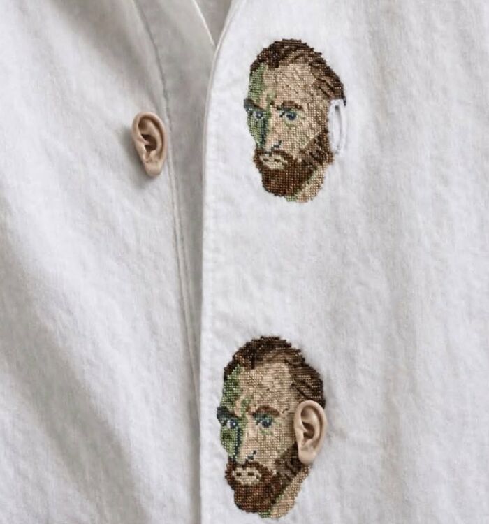 No context humans meme featuring two embroidered Vincent Van Gogh heads with ears as buttons on a white shirt.