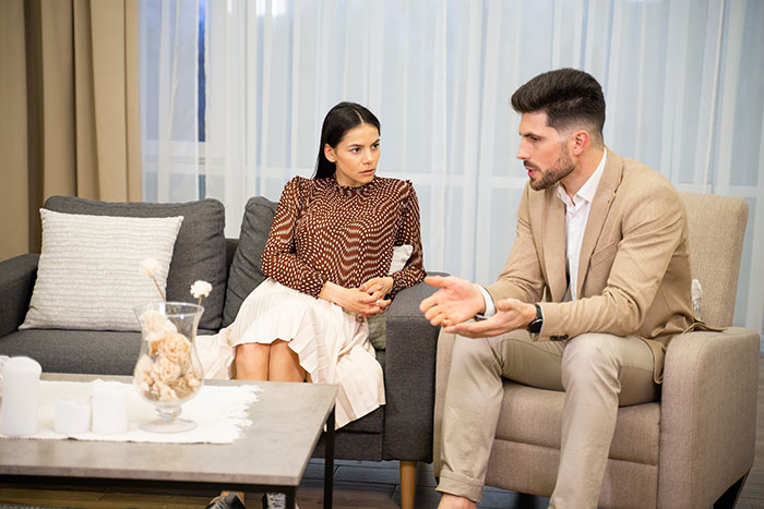 A woman looking for advice on her husband from an unknown man.