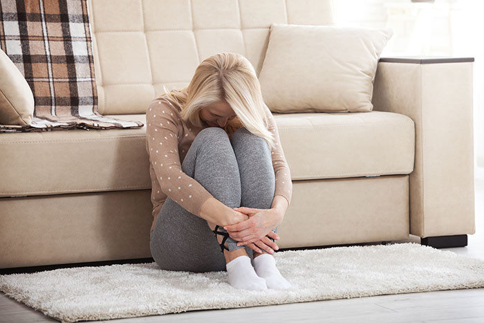 A woman sits on the floor, looking distressed, after changes to donating a kidney to BIL. A woman sits on the floor, looking distressed, after changes to donating a kidney to BIL.