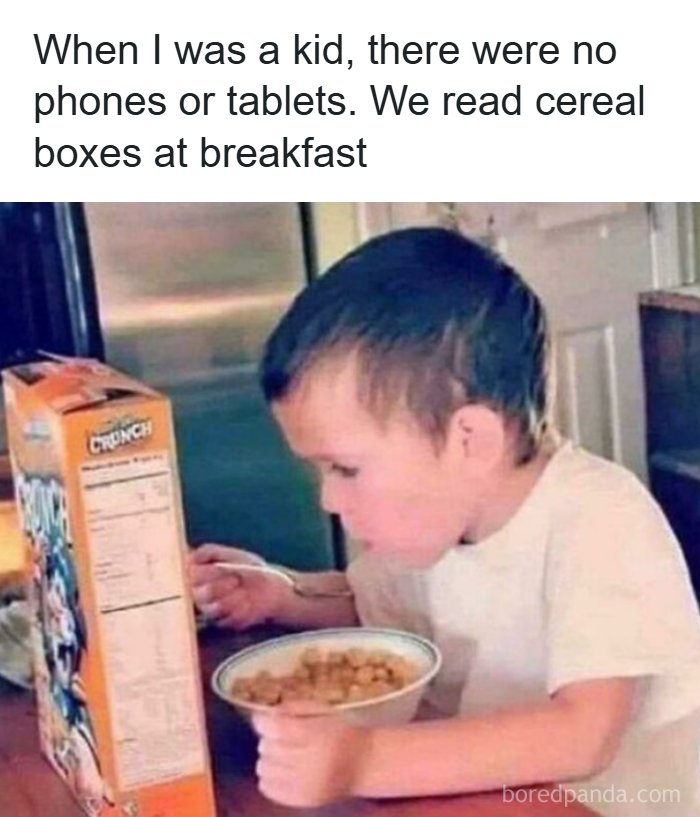 A child at breakfast, reading a cereal box, a common scene from the 80s, creating good memories.
