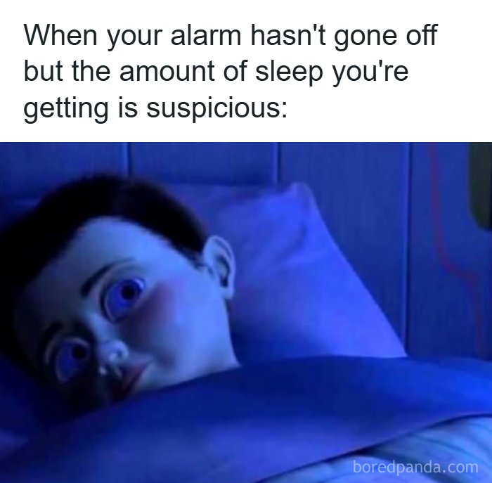 A hilarious meme featuring a wide-eyed child in bed, implying suspicious sleep.