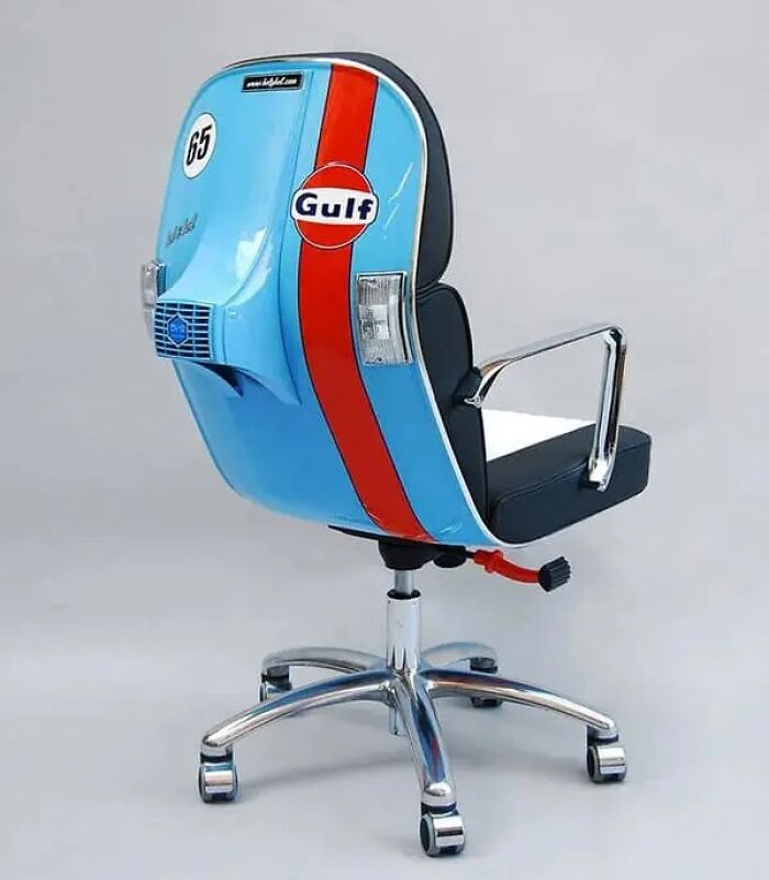 A unique blue and orange Gulf-branded Vespa scooter office chair, a bizarre piece of furniture design.