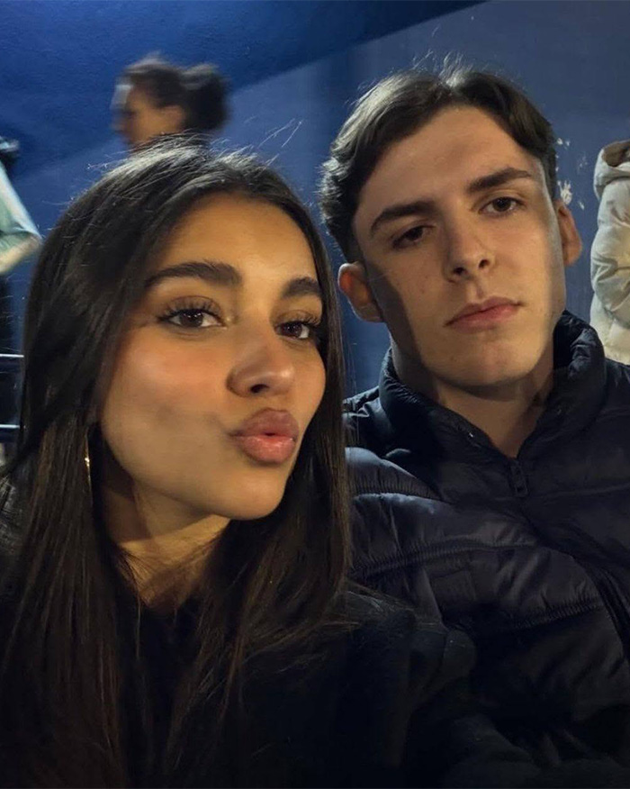 The World Cup hero's girlfriend taking a selfie with another man. The World Cup hero's girlfriend taking a selfie with another man.