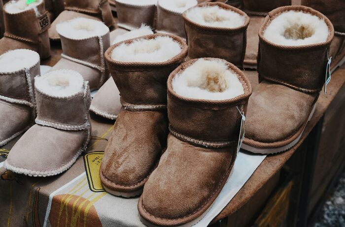 Brown sheepskin boots displayed, showing products that swapped audiences and trends.