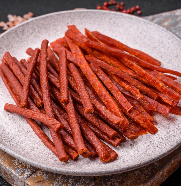 Plate full of meat sticks, the trendy snack food