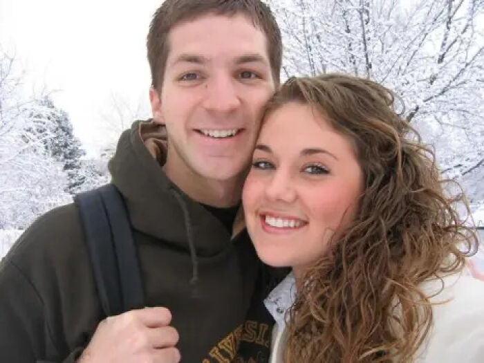 A happy couple, John Jones and his wife, in a snowy outdoor setting, before the Nutty Putty Cave incident.