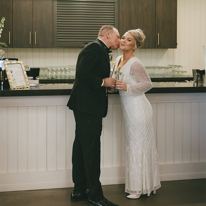 Karoline Leavitt and husband share a kiss, highlighting the age gap in their marriage.