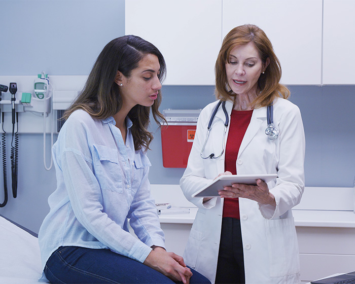 A female doctor consulting with a female patient, discussing libido and offering medical advice.